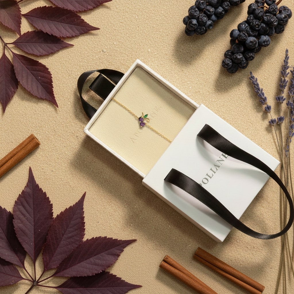 Jewelry box with a necklace on a beige surface with leaves and cinnamon sticks.
